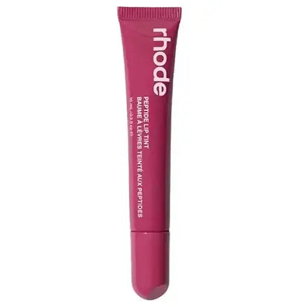 Pink lip balm tube with 'rhode' branding on a white background